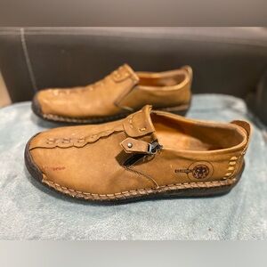 Very soft and comfy Clohco shoes. Measures 12”.